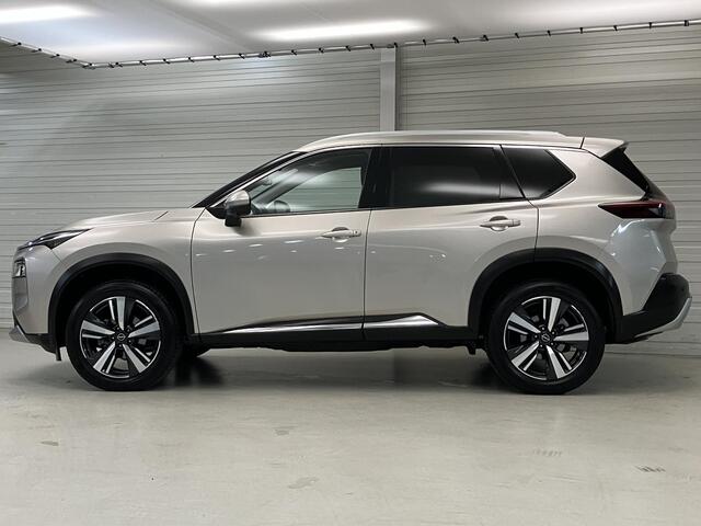 Nissan X-TRAIL 1.5 MHEV 163pk 5-Zits Tekna Automaat / 2000 KG Trekgewicht / Navigatie / 360 Graden Camera / Stoel- en Stuurverwarming / Verwarmde Voorruit / Fabrieksgarantie tot 07-2027 / Elektrische Kofferbak / Elektrische Stoelen met Geheugen /