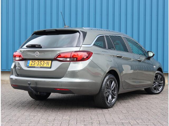 Opel ASTRA Sports Tourer 1.4 150PK Turbo 120 Jaar Edition | AppleCarPlay/AndroidAuto | Climate Control | Navigatie | Armsteun | Cruise Control | Trekhaak | Parkeersensoren | Privacy Glass | Isofix |