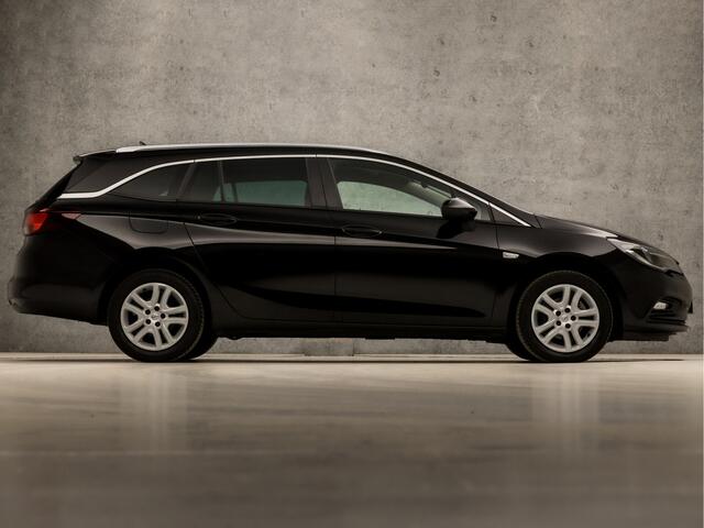 Opel ASTRA Sports Tourer 1.0 Turbo Sport (APPLE CARPLAY, GROOT NAVI, CLIMATE, SPORTSTOELEN, LEDER, PARKEERSENSOREN, GETINT GLAS, LM VELGEN, NIEUWSTAAT)