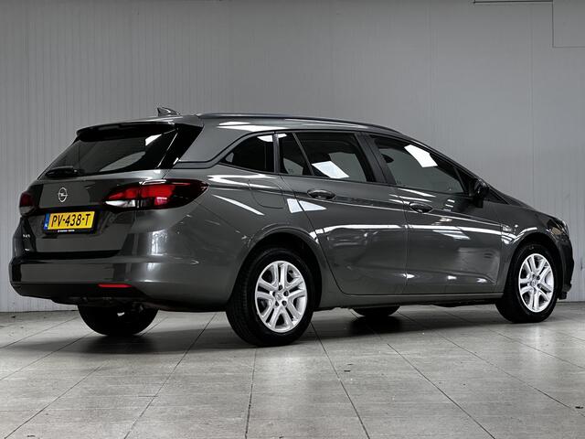 Opel ASTRA Sports Tourer 1.0 Online Edition/ PDC V+A/ Apple + Android/ DAB+/ Navi/ Airco/ Cruise/ Elek. pakket/ Isofix/ Bluetooth/ Armsteun/ Multi. LEDER. Stuur/ LED Dagrijverl.