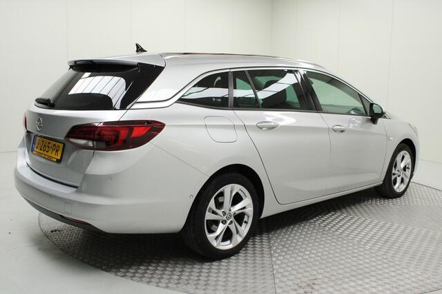 Opel ASTRA Sports Tourer 1.4 Elegance | automaat | schuif kantaldak | climate control | pdc v/a + camera | matrix | stuur-stoel verwarming | dode hoek | carplay | keyless | bluetooth | cruise