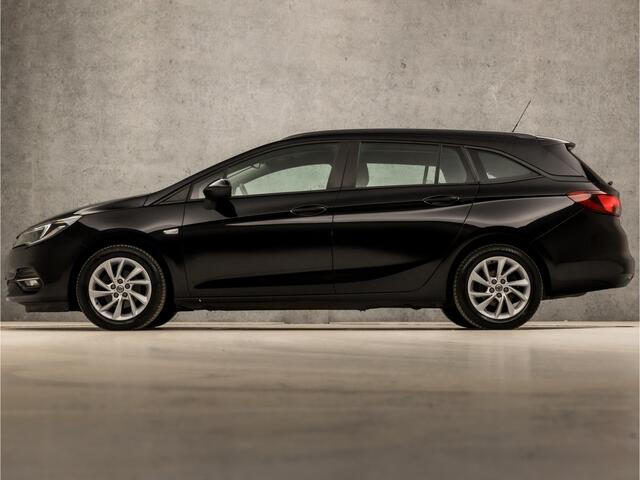 Opel ASTRA Sports Tourer 1.2 Sport (APPLE CARPLAY, NAVIGATIE, CAMERA, CLIMATE, CRUISE, SPORTSTOELEN, PARKEERSENSOREN, NIEUWE APK, NIEUWSTAAT)
