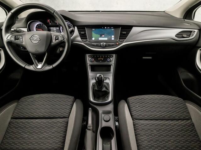 Opel ASTRA Sports Tourer 1.2 Sport (APPLE CARPLAY, NAVIGATIE, CAMERA, CLIMATE, CRUISE, SPORTSTOELEN, PARKEERSENSOREN, NIEUWE APK, NIEUWSTAAT)