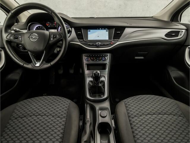 Opel ASTRA Sports Tourer 1.2 Sport (APPLE CARPLAY, NAVIGATIE, CAMERA, STUUR/STOELVERWARMING, CLIMATE, GETINT GLAS, SPORTSTOELEN, LED KOPLAMPEN, LM VELGEN, TREKHAAK, DAB+, NIEUWE APK, NIEUWSTAAT)