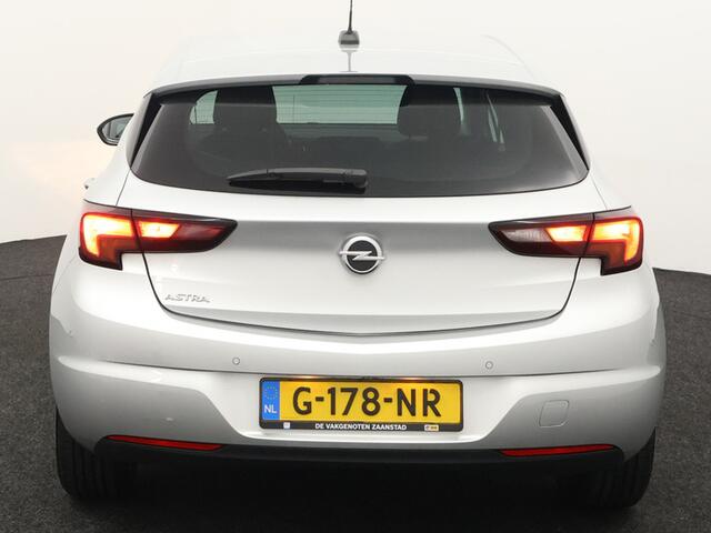Opel ASTRA 1.0 Turbo 120 Jaar Edition Airco, Apple Carplay/Android Auto, Bluetooth, Boordcomputer, Cruise control, Elek. Stabiliteits Programma, Stuur multifunctioneel, Regensensor, Warmtewerend glas, Navigatiesysteem full map De Opel Astra 1.0 Turbo 120 Jaar Editio
