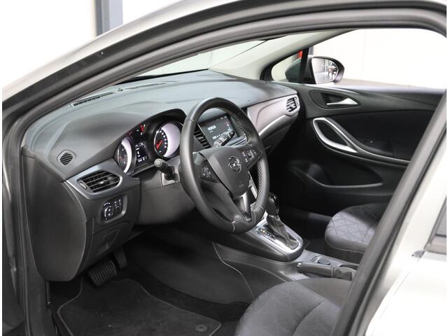Opel ASTRA 150PK 120 Jaar Edition | 1ste eigenaar | AppleCarPlay/AndroidAuto | Climate Control | Parkeersensoren VOOR+Achter | Navigatie | Privacy Glass | AUTOMAAT | Isofix | LMV |
