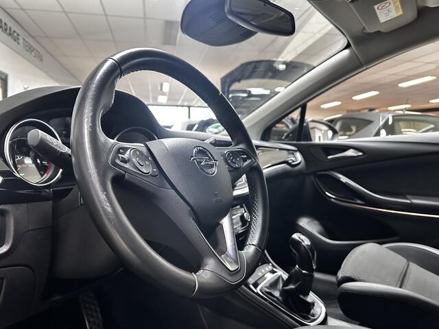 Opel ASTRA 1.6 CDTI Innovation/ 136pk!/ Trekhaak/ Sportstoelen/ 17'' LMV/ Camera/ Dode-Hoek DET./ Half-Leder/ Lane-Assist./ Keyless/ Apple + Android/ Navi/ PDC V+A/ DAB+/ Clima/ Cruise/ Multi. LEDER. Stuur/ Extra getint gla