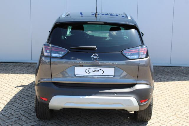 Opel Crossland 1.2-110pk Turbo 'Elegance'. Mooie en luxe hoogzitter met weinig km's ! Volautm. airco dual, cruise control, camera, comfortstoelen, metallic lak, LM wielen, navigatie, telefoonvoorb., lane- en side assist, parkeersensoren v+a, LED verlichting etc.