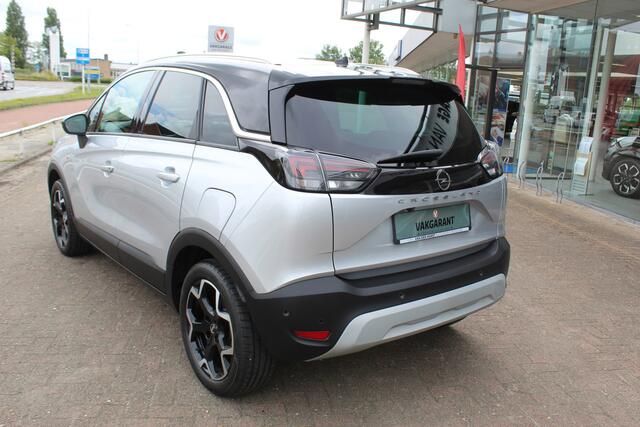 Opel Crossland 1.2-110pk Turbo 'Elegance'. Mooie en luxe hoogzitter met weinig km's ! Volautm. airco dual, cruise control, camera, comfortstoelen, metallic lak, LM wielen, navigatie, telefoonvoorb., lane- en side assist, parkeersensoren v+a, LED verlichting etc.