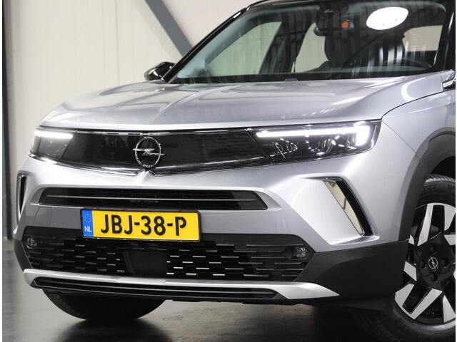 Opel MOKKA Mokka-e Elegance 50-kWh 136PK | AppleCarPlay/AndroidAuto | Cruise Control | Climate Control | Camera | Digitale Cockpit | Navigatie | FULL LED | TwoTone | Isofix | Armsteun |