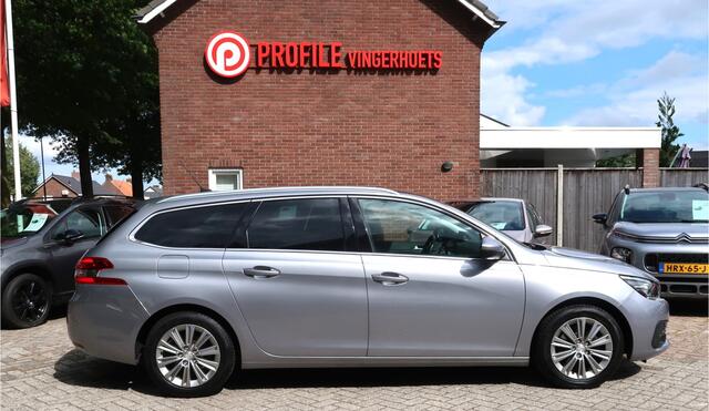 Peugeot 308 SW 130 Pk Premium Allure SW Benzine Zwart Lederen Bekleding * Elektrisch en Verwarmde Stoelen met Massage * Panoramadak * Achteruitrij Camera * Dodehoekdetectoren * L.M. Velgen * Navigatie * Climate & Cruise Control * Vingerhoets; Vierde Generatie Eerstek
