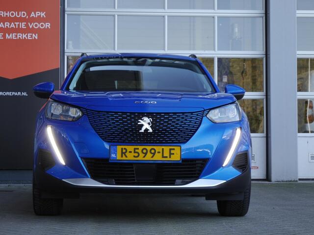 Peugeot e-2008 EV Allure 50 kWh | Stoelverwarming | Lichtmetalen velgen | Parkeersensoren | Cruise control | Climate control | Keyless entry & start | Navigatie | Led