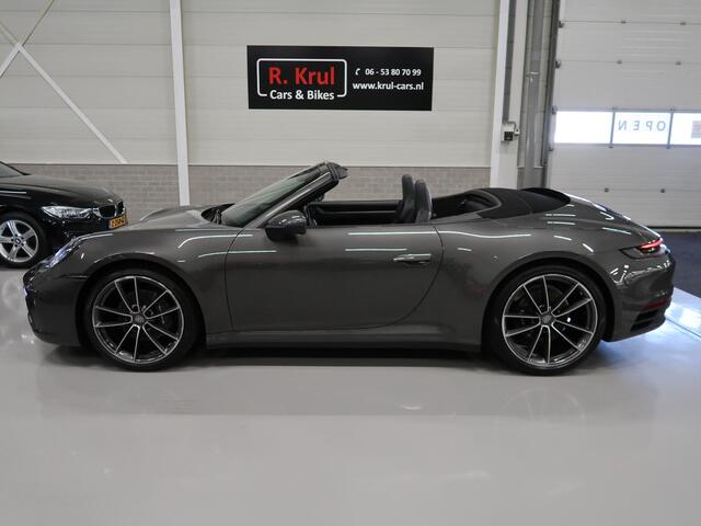 Porsche 911 Cabrio 3.0 Carrera 992 Bose 360 Camera Sportuitlaat PASM Sport-Chrono 21 inch Approved garantie 10/2026 4 Nieuwe banden Groot onderhoud gehad PPF folie NIEUWSTAAT Flippers Stoelverkoeling LED PDLS