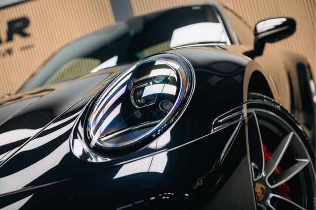 Porsche 911 3.0 Carrera 4 | Sport chrono | verwarmde en verkoelde sportstoelen | schuif-/kanteldak |