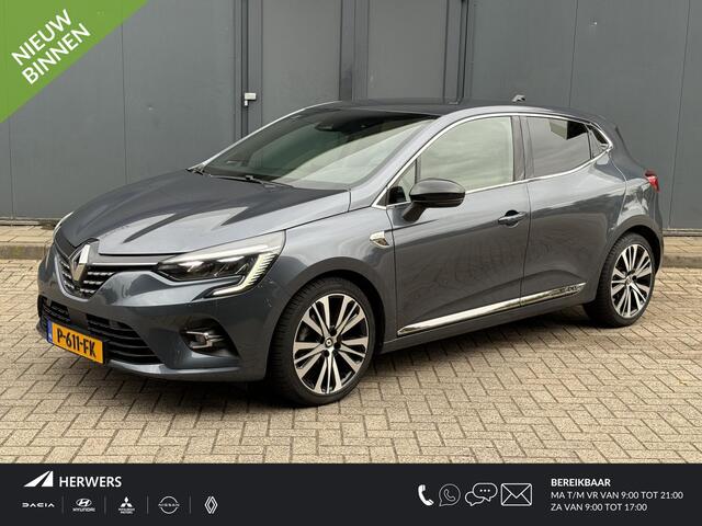 Renault CLIO 1.6 E-Tech Hybrid 140 Initiale / Trekhaak / Stuurverwarming / Stoelverwarming / All Season Banden / Navigatie / Achteruitrijcamera / Cruise Control