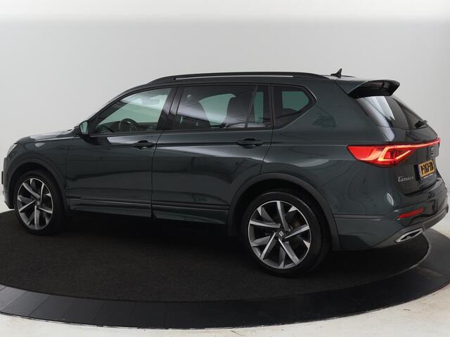 Seat Tarraco 1.5 TSI FR | Trekhaak | Carplay | Camera | Adaptive cruise | Trekhaak | Navigatie | Memory | Full LED | Sfeerverlichting | Keyless | Park Assist | 20'' lichtmetalen velgen