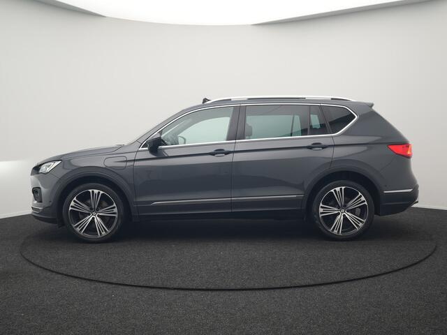 Seat Tarraco 1.4 TSI e-Hybrid Xcellence Plug In Hybrid 245pk Dealer O.H PHEV | Trekhaak Af Fabriek | Panodak | Adaptive Cruise | 360 Camera | Lederen Sportstoelen Memory & Verwarmd | Apple Carplay | Virtual | Stuur Verwarmd | Blis | Navigatie | DAB | 20"L.M |