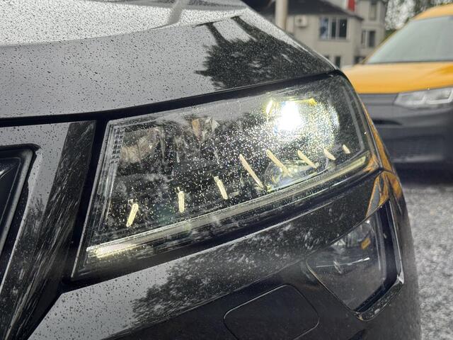 Skoda Karoq 1.5 TSI 150pk DSG 4x4 Sportline (Trekhaak,Camera,Navi,Carplay)