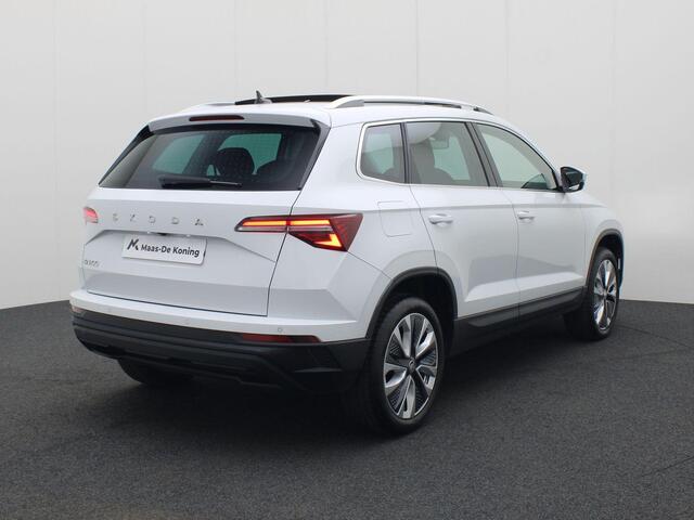 Skoda Karoq 1.5TSI/150PK Design DSG · Panoramadak · App connect · Camera + Parkeersensoren Garantie tot maart 2028 of 60000km.