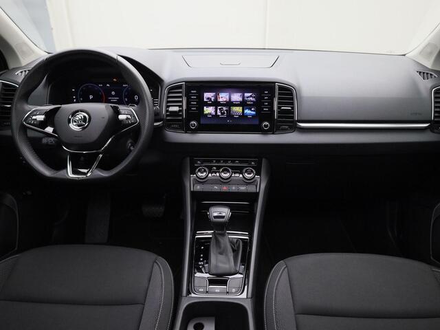 Skoda Karoq 1.5TSI/150PK Design DSG · Panoramadak · App connect · Camera + Parkeersensoren Garantie tot maart 2028 of 60000km.