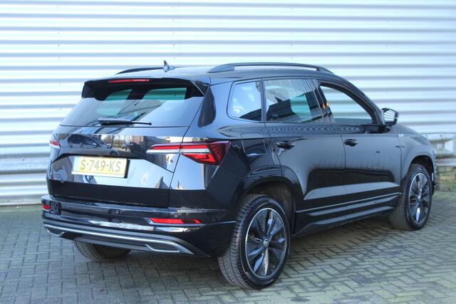 Skoda Karoq 1.5 TSI ACT 150pk Sportline Business DSG7 NL-Auto NAP Clima Cruise Navi Camera Trekhaak 1500kg
