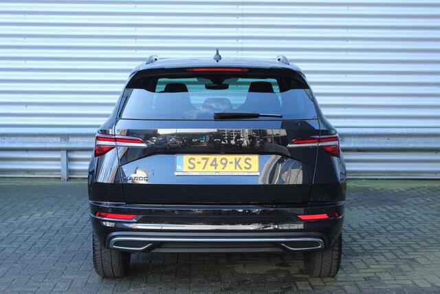 Skoda Karoq 1.5 TSI ACT 150pk Sportline Business DSG7 NL-Auto NAP Clima Cruise Navi Camera Trekhaak 1500kg