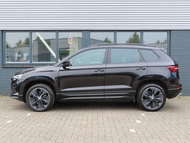 Skoda Karoq 1.5 TSI ACT Sportline Business DSG | voorruitverwarming | verwarmbare voorstoelen + achterbank | stuurwiel verwarmbaar | camera