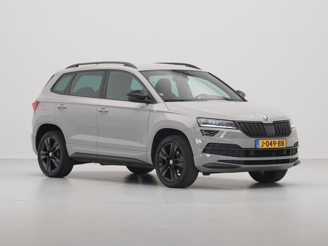 Skoda Karoq 1.5 TSI ACT 150pk DSG Sportline Business Navigatie CantonSound Stoelverwarming Camera Carplay Sideassist