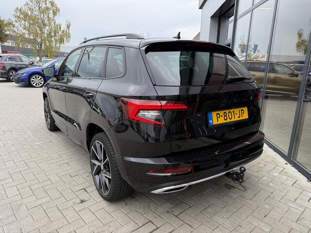 Skoda Karoq 1.5 TSi 150 Pk Automaat Sportline Business | Adaptive Cruise | Climate Control | Keyless | Stoelverwarming | Canton | Trekhaak | Navigatie | Camera | Carplay | LED | 123.026 Km!!