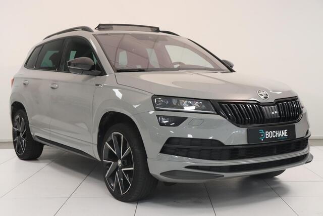 Skoda Karoq 1.5 TSI ACT Sportline Business | Adaptieve cruisecontrol | Camera | Panoramadak | Trekhaak | CANTON audio | Elektr achterklep | Stuur en stoel verwarming |