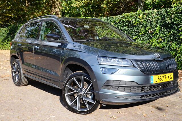 Skoda Karoq 1.5 TSI ACT Sportline Business Automaat/Led/Pdc/Ecc/Navi/Virtual Cockpit/Cruise control adaptief/Privacy-Glass/Achteruitrijcamera/Stoelverwarming/19-Inch Lmv