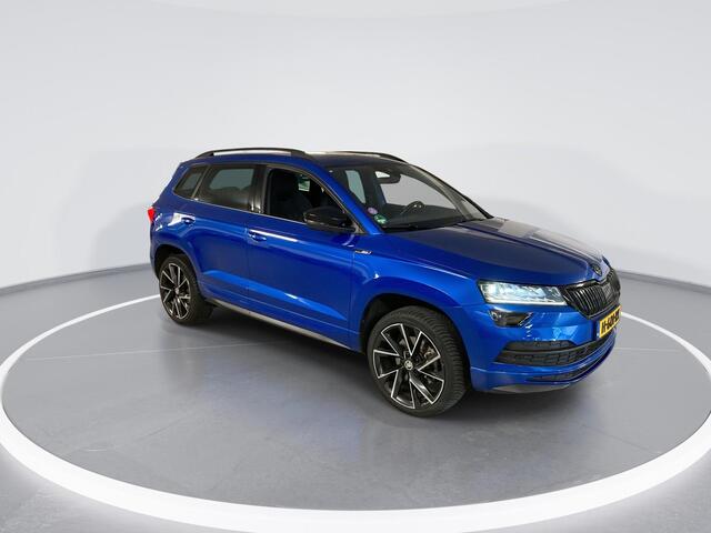 Skoda Karoq 1.5 TSI ACT 150pk DSG Sportline Business · Panoramadak · Camera · Trekhaak · Apple/Android Car Play · 19'' LMV · Keyless ·