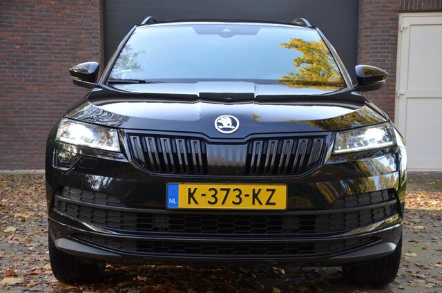 Skoda Karoq 1.5 TSI ACT Sportline Business Automaat/Navi/Audio installatie premium/Led/Pdc/Ecc/Stoelverwarming/Virtual Cockpit/Achteruitrijcamera/Cr-Control adaptief/Privacy-Glass/Panoramadak