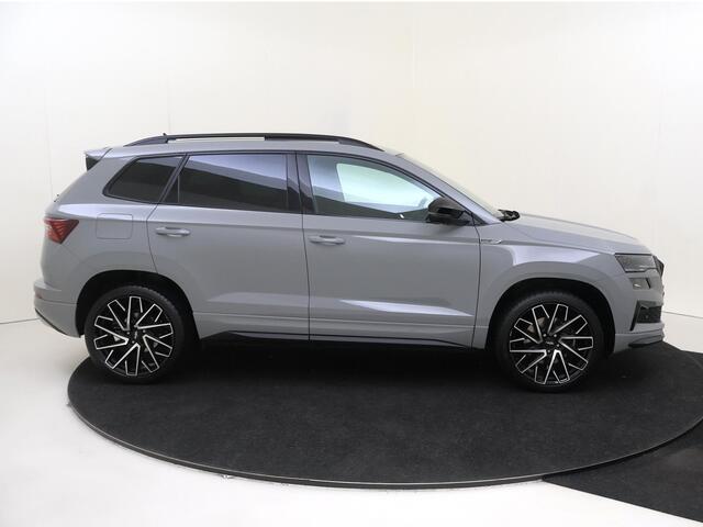 Skoda Karoq 1.5 TSI ACT Sportline Business | Panoramadak | Adaptieve demping systeem | Achteruitrijcamera | Keyless | Stoel- en stuurwielverwarming | Adaptieve cruise control | CarPlay |