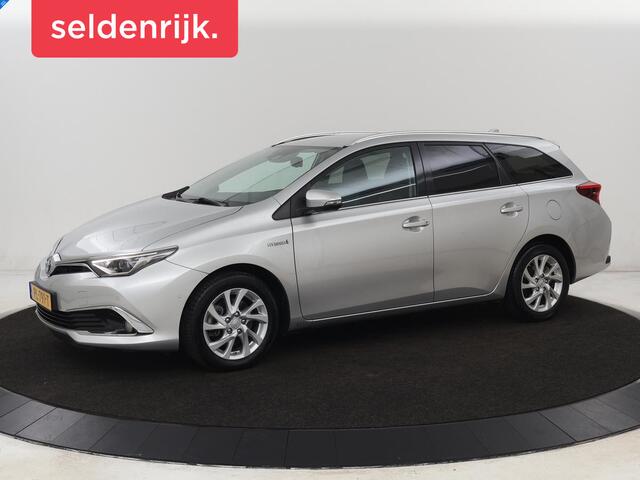 Toyota AURIS 1.8 Hybrid Executive | Stoelverwarming | Trekhaak | Leder/Alcantara | Navigatie | Full LED | Park Assist | Climate control | Cruise control | Keyless | Regensensor