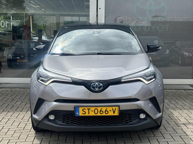 Toyota C-HR 1.8 Hybrid Bi-Tone | Leder | Stoelverwarming | Zomer + winterbanden | Parkeersensoren voor en achter | Toyota Garantie tot 2028!