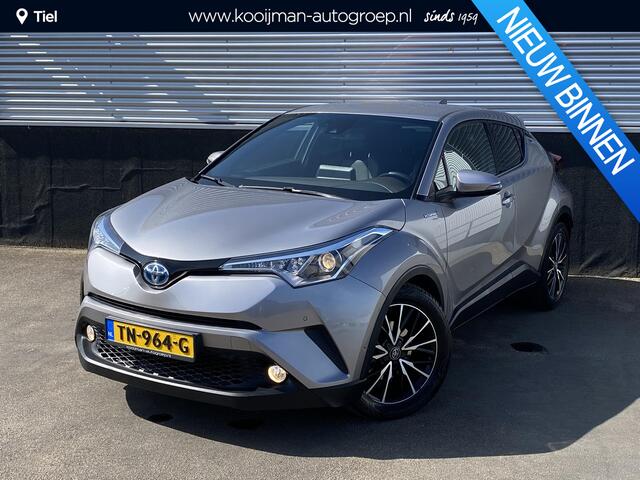 Toyota C-HR 1.8 Hybrid Bi-Tone Plus Trekhaak, dodehoek detectie, navigatie, stoel- & stuurverwarming, achteruitrij camera, parkeersensoren, lederen bekleding, Volledig dealeronderhouden