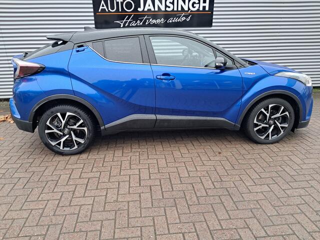 Toyota C-HR 1.8 Hybrid Bi-Tone | Clima | Cruise | Vol leder | Navigatie | LM Velgen | Keyless | Camera | RIJKLAARPRIJS INCL 12 MAANDEN GARANTIE EN BEURT