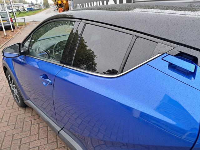 Toyota C-HR 1.8 Hybrid Bi-Tone | Clima | Cruise | Vol leder | Navigatie | LM Velgen | Keyless | Camera | RIJKLAARPRIJS INCL 12 MAANDEN GARANTIE EN BEURT