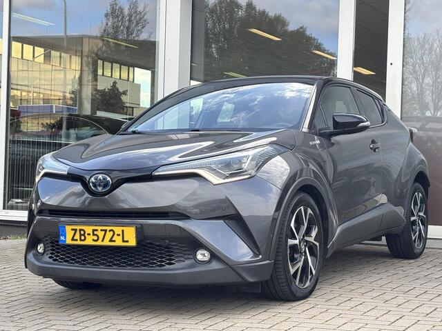 Toyota C-HR 1.8 Hybrid Bi-Tone | Stoel en stuurverwarming | Navigatie | Blindspot | Toyota garantie tot 2028!