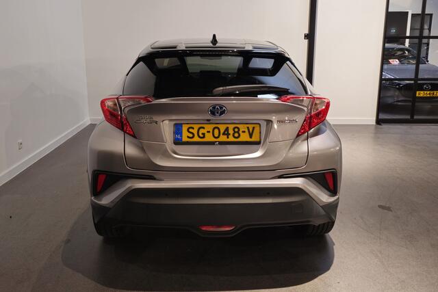 Toyota C-HR 1.8 Hybrid Style Bi-Tone - Stoelverwarming - Adaptive Cruise - Dodehoekdetectie - JBL Audio