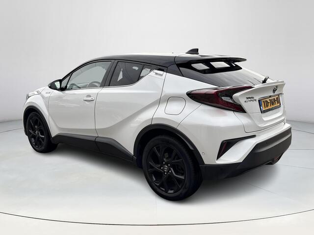 Toyota C-HR 1.8 Hybrid Bi-Tone **NAVIGATIE/ DODEHOEK DETECTIE/ STOELVERWARMING/ ADAPTIEF CRUISE CONTROL**