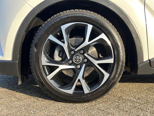 Toyota C-HR 1.8 Hybrid Bi-Tone | Navigatie | Stoelverwarming | 18 inch LM-Velgen | Trekhaak |