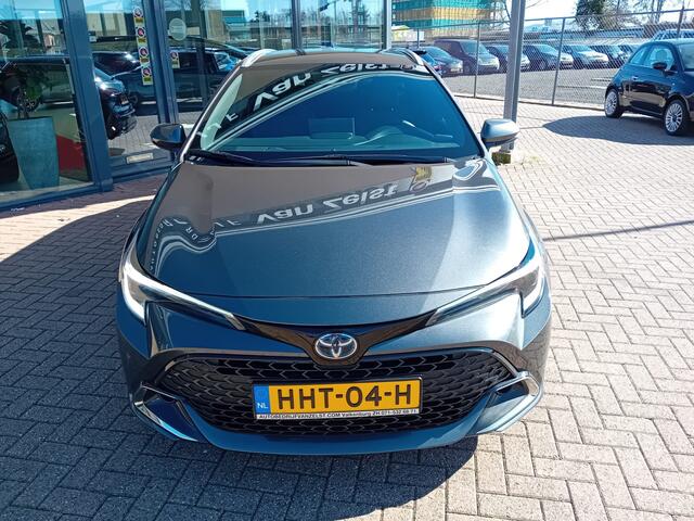 Toyota COROLLA Touring Sports 1.8 Hybrid First Edition, Airco(automatisch), Carplay, Cruise control adaptief, Dode hoek detector, Stoelverwarming, Navigatie, enz enz.... Zeer mooie auto, Zie foto's, Fabrieksgarantie, BOVAG