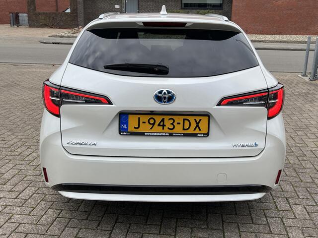 Toyota COROLLA Touring Sports 1.8 Hybrid Business Plus Navigatie* Carplay Camera Keyless Led Stoelverwarming ACC Dab 17 Inch Velgen Getint Glas NL Auto Wit Metallic
