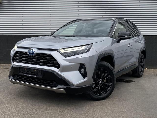 Toyota RAV4 2.5 Hybrid AWD Bi-tone Trekhaak, stoel- & stuurverwarming, keyless, achteruitrij camera, parkeersensoren v&a, navigatie Apple CarPlay/Android Auto