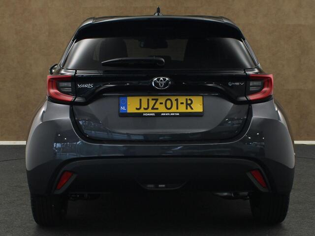 Toyota YARIS 1.5 Hybrid 115 Dynamic - DIRECT UIT VOORRAAD LEVERBAAR - KEYLESS ENTRY & START - STOEL EN STUUR VERWARMING - ADPATIVE CRUISE CONTROL - ACHTERUITRIJ CAMERA - DRAADLOZE TELEFOONLADER