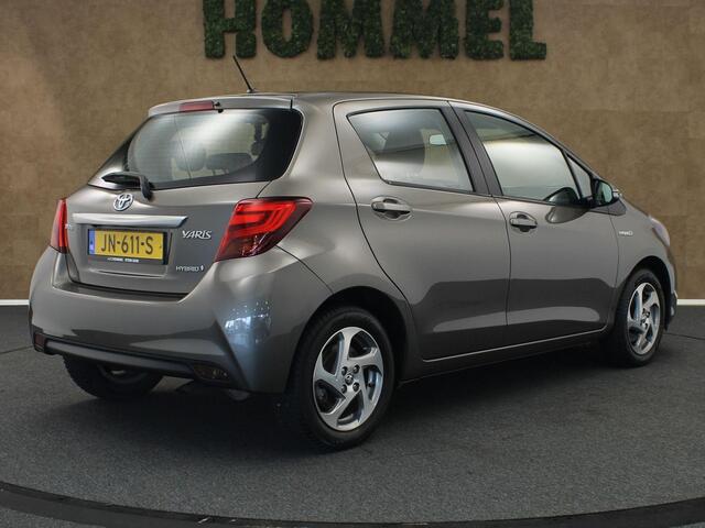 Toyota YARIS 1.5 Hybrid Trend - ORIGINEEL NEDERLANDSE AUTO - AFKOMSTIG VAN 2E EIGENAAR - VOLLEDIG ONDERHOUDEN - ALLE BOEKJES AANWEZIG- NAVIGATIE - CLIMATE CONTROL - LEDEREN STUUR - BOTSWAARSCHUWINGSSYSTEEM - 15 INCH LICHT METALEN VELGEN