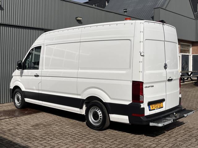 Volkswagen CRAFTER 35 2.0 TDI L3H3 oud L2H2 Airco Cruise control Trekhaak 3000kg Kastinrichting Omvormer Standkachel werkplaats Navigatiesysteem Telefoonverbinding 2-Persoons Camera