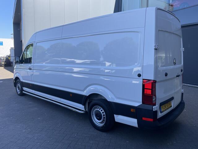 Volkswagen CRAFTER 35 2.0 TDI L4H3 Highline Airco - parkeersensoren achter - cruise control - zijschuifdeur rechts - tussenschot volledig - Ideaal voor camper